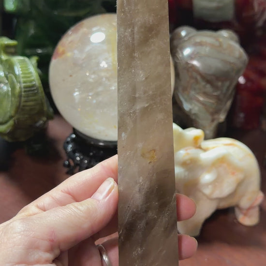 Video preview of natural smoky quartz crystal tower with polished point
